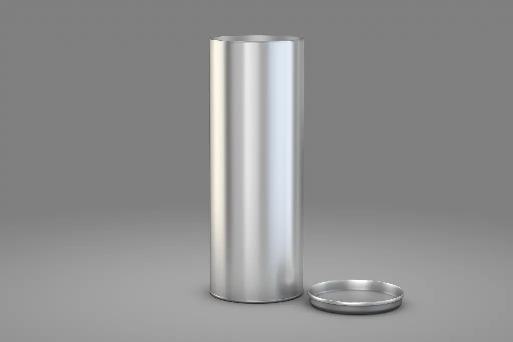 Silver cylinder with open lid on gray background. Image depicting cylinder.